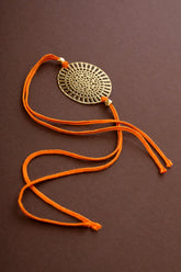 Dial design Rakhi cum keychain ring for Bhai/brother crafted in brass with golden finish