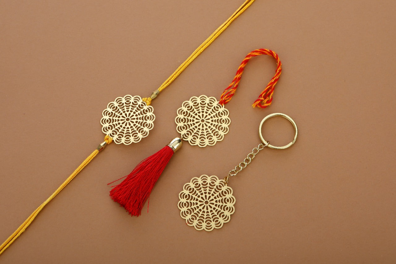 Floral design Rakhi cum keychain ring for Bhai/brother crafted in brass with golden finish