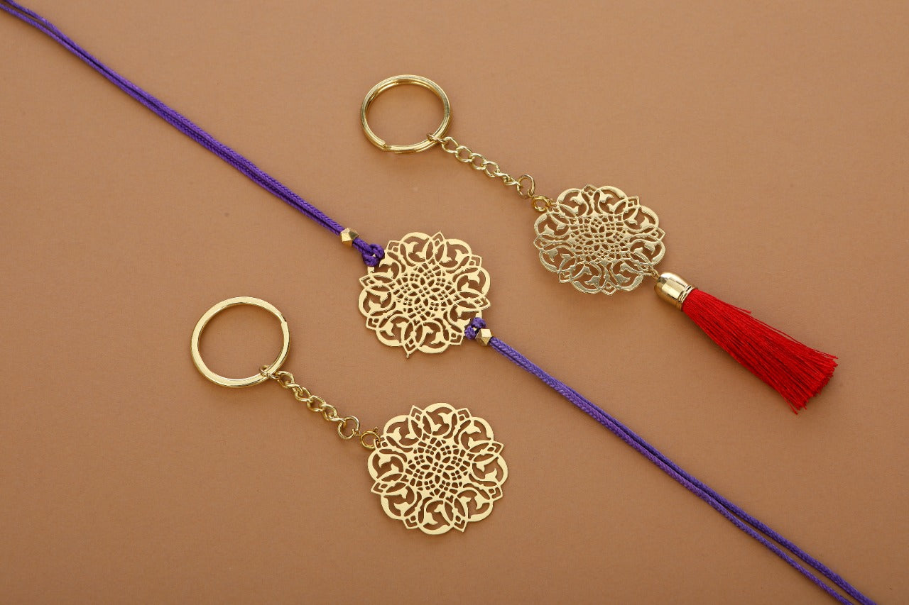 Jaali design Rakhi cum keychain ring for Bhai/brother crafted in brass with golden finish