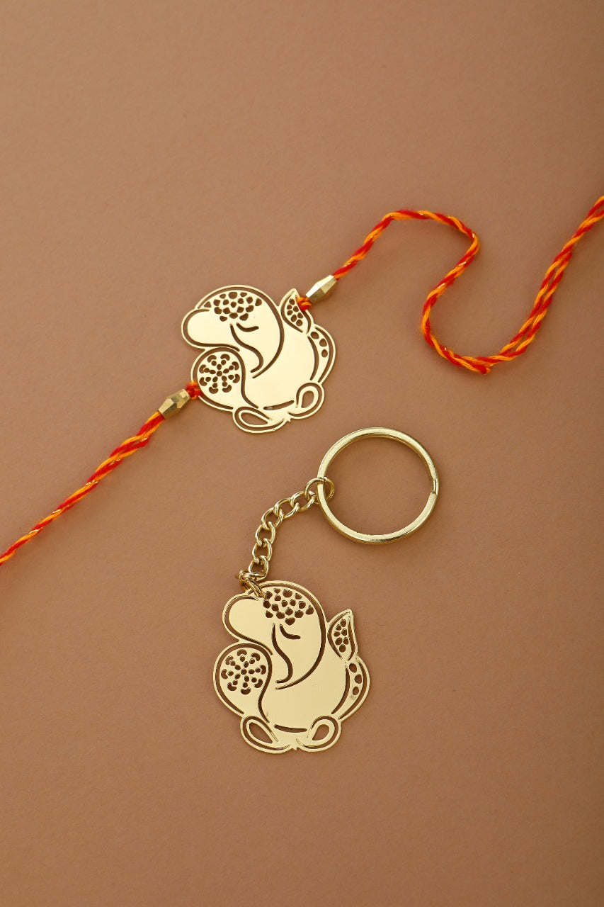 Ganesha design Rakhi cum keychain ring for Bhai/brother crafted in brass with golden finish