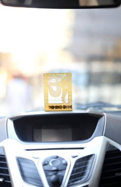 Om Ganesha Desk/Car Dashboard Décor crafted in brass with golden finish