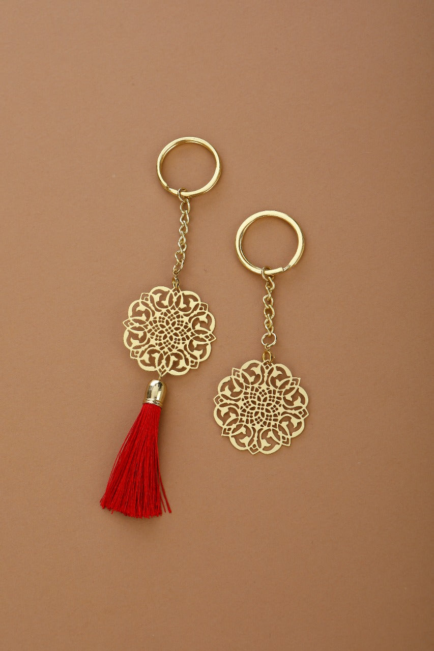 Jaali design Rakhi cum keychain ring for Bhai/brother crafted in brass with golden finish